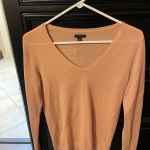 Excellent condition pale pink V-neck sweater. Worn a few times,  like new.